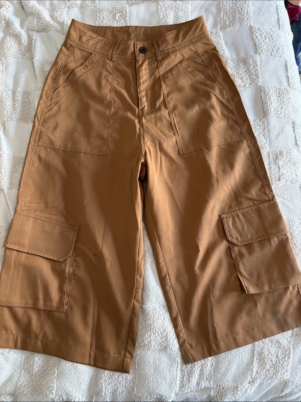 Slightly stained khaki long shorts